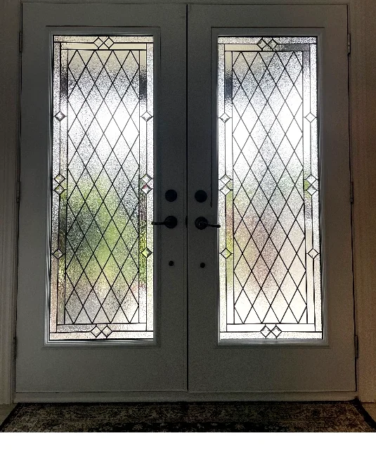 Front door after a new decorative glass insert, Ottawa