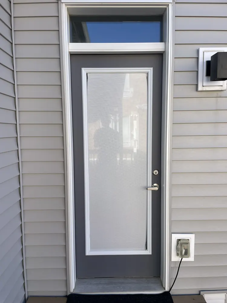 Back door with plain glass before privacy upgrade, Ottawa