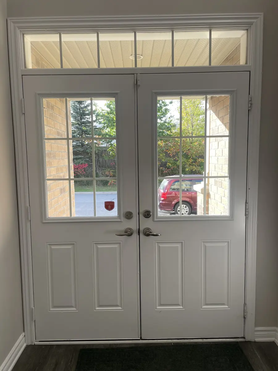 Double doors with plain grid glass before, Ottawa