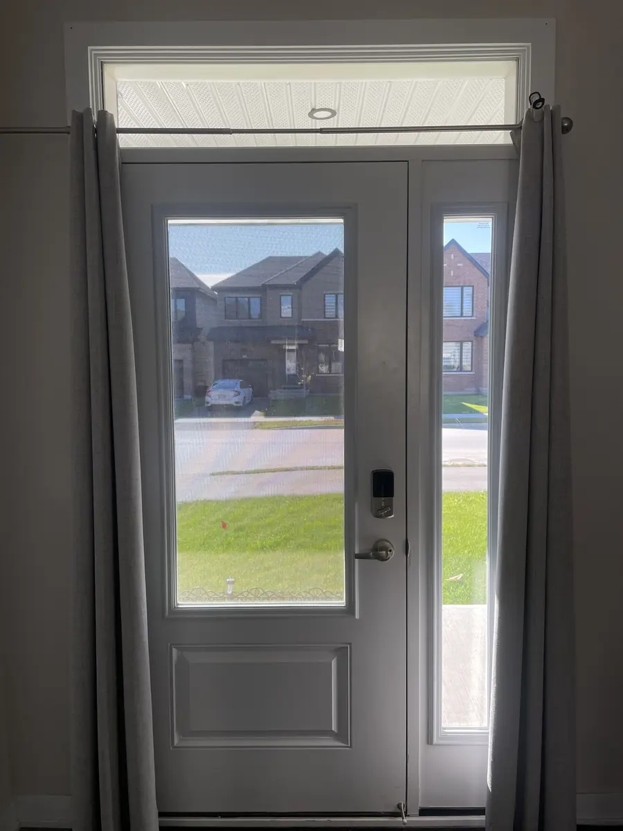 Front door before its new stained glass insert, Ottawa