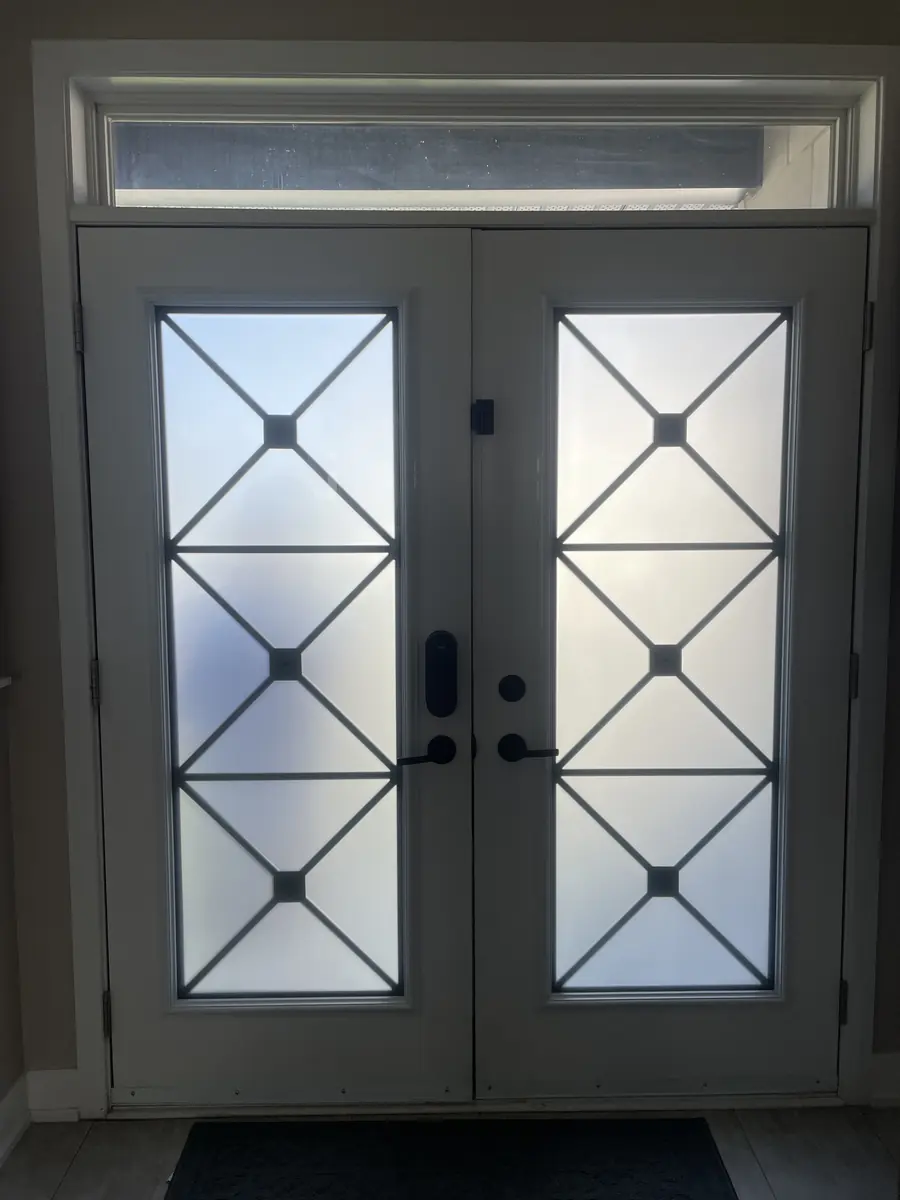 Double front doors after new wrought iron glass inserts, Ottawa