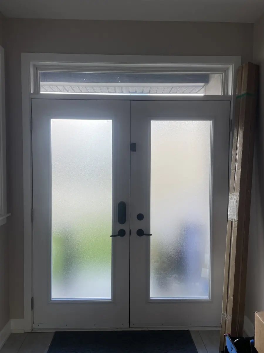 Double front doors with plain frosted glass before, Ottawa