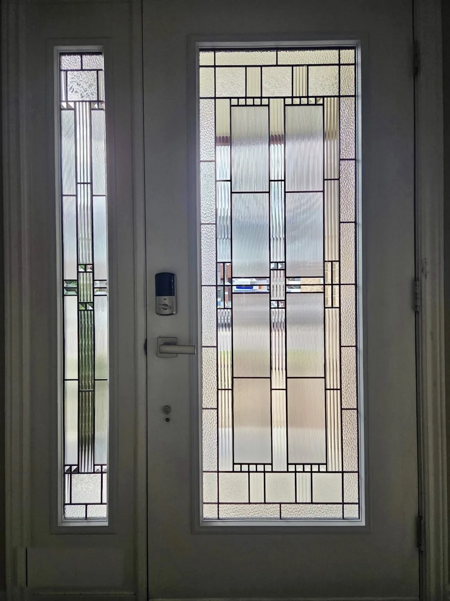 Front door in Ottawa with a new decorative glass insert after a glass replacement